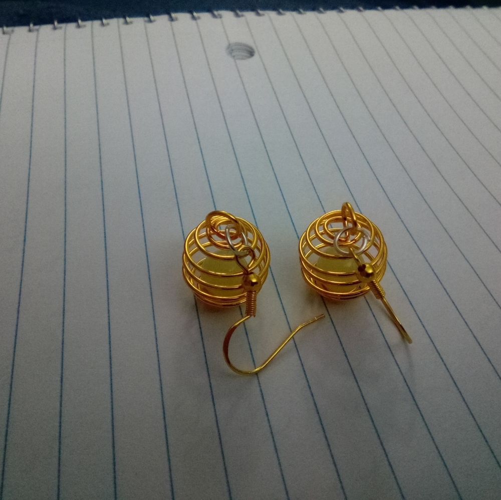Gold Colored Spiral Cage Earrings with Glow in the dark Beads